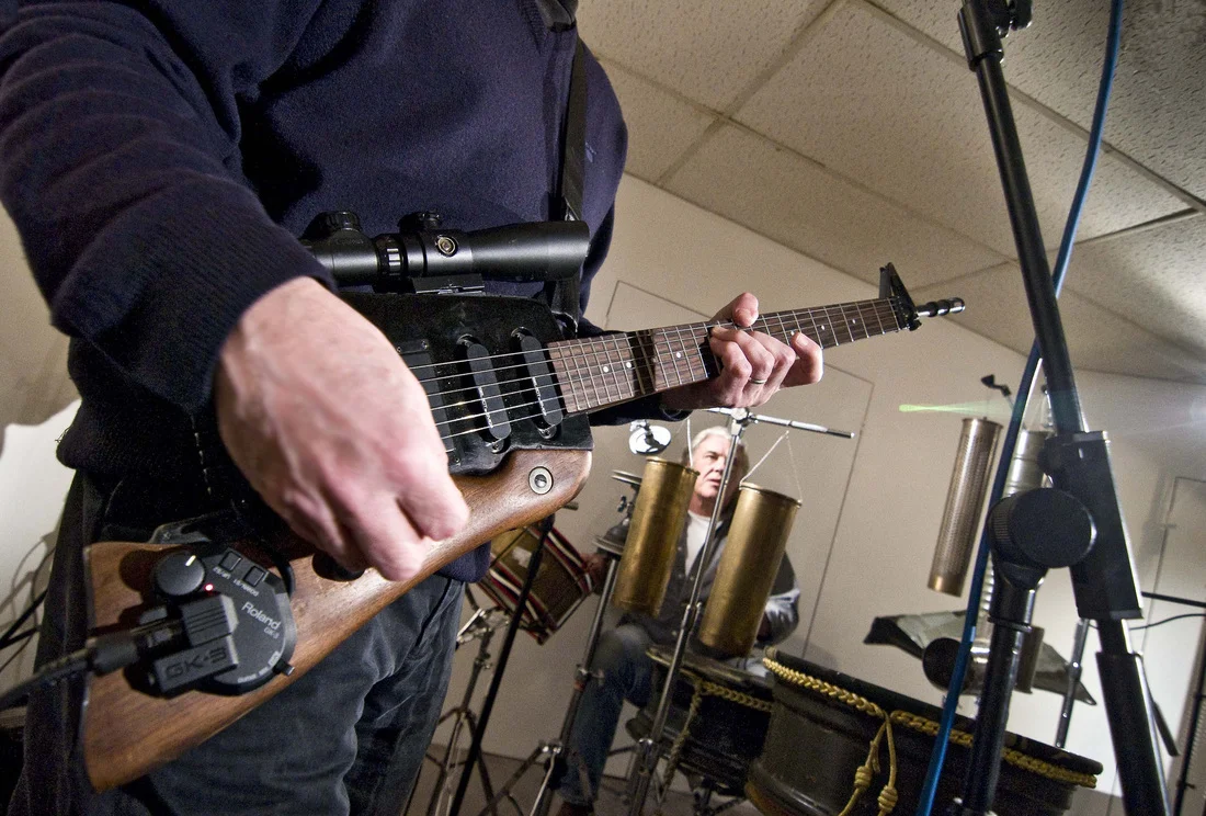 War &amp; Garbage Into Music: Transducing Negativity With The Post War Orchestra