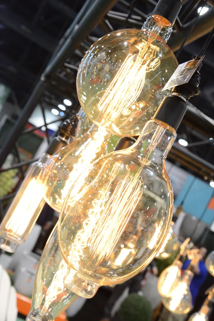 Edison style bulbs aren't a huge light source but they are so pretty they can be used without ashade.