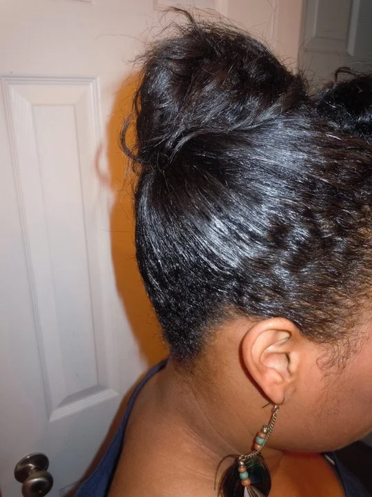 I noticed how wavy and pretty the roots of my hair were and I started asking my natural friends for advice on letting the relaxer grow out. I went a step further and started watching YouTube videos about other women who had gone natural (who knew that there were so many YouTube videos about it!??) and NikkiMae2003 was the YouTube user who convinced me to start my journey.