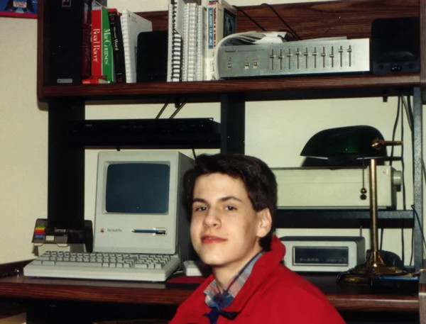 The author with his first Macintosh, a Mac Plus, alongside an Imagewriter I printer and a 20MB CMS SCSI hard disk drive, circa 1989-90.