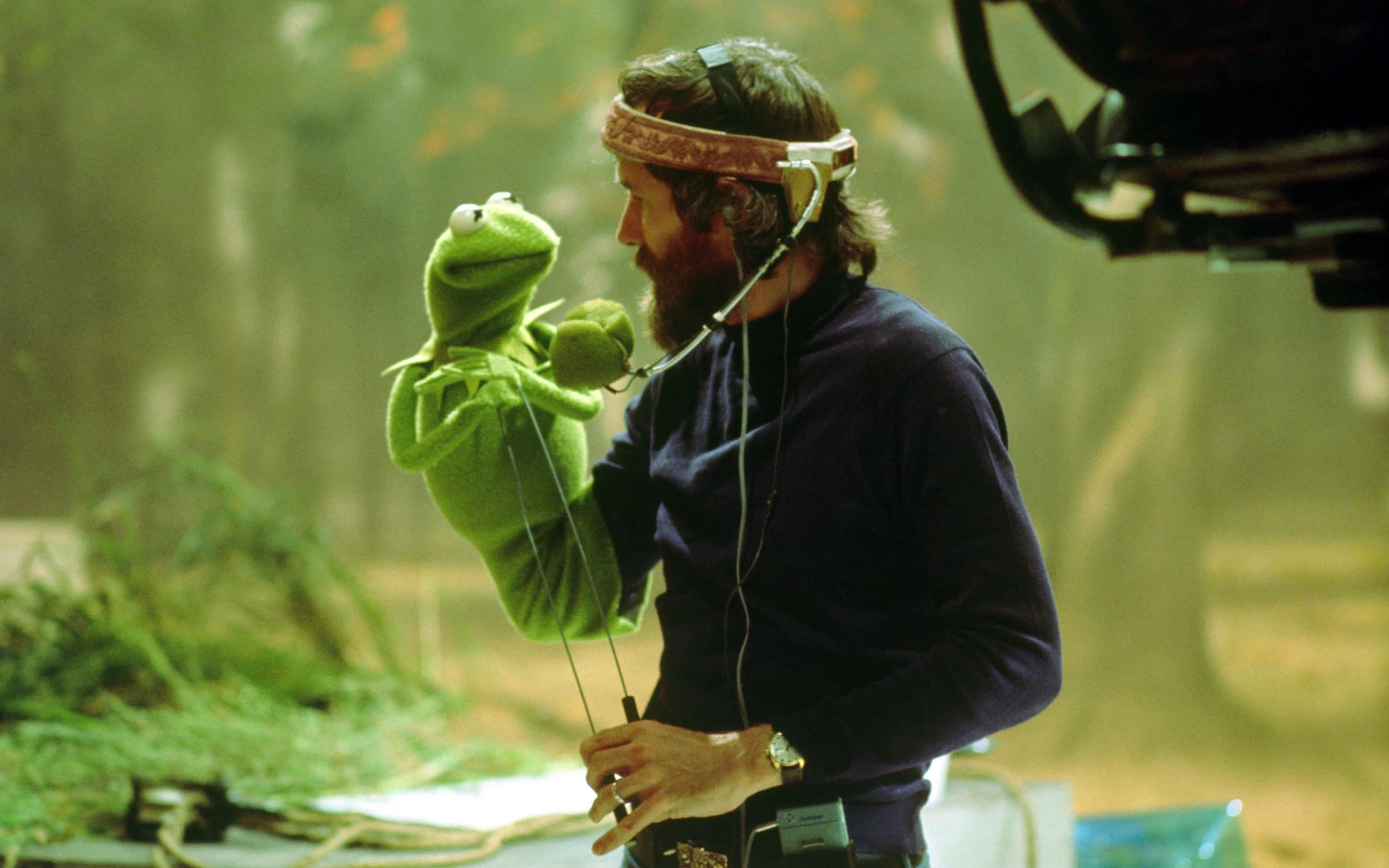 A 1978 photo captures a candid moment between James Maury "Jim" Henson and Kermit the Frog on the set of "The Muppet Movie"