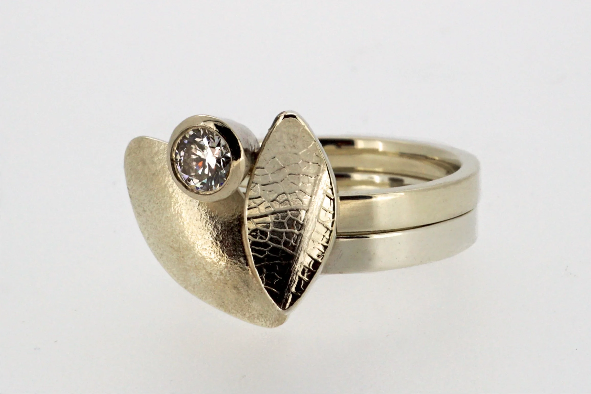 Leaf duo engagement and wedding rings with diamond