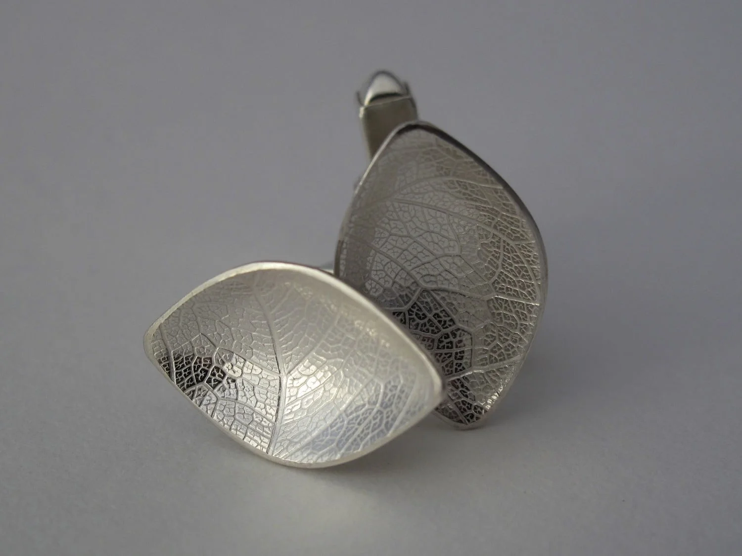 Leaf skeleton embossed silver cufflinks