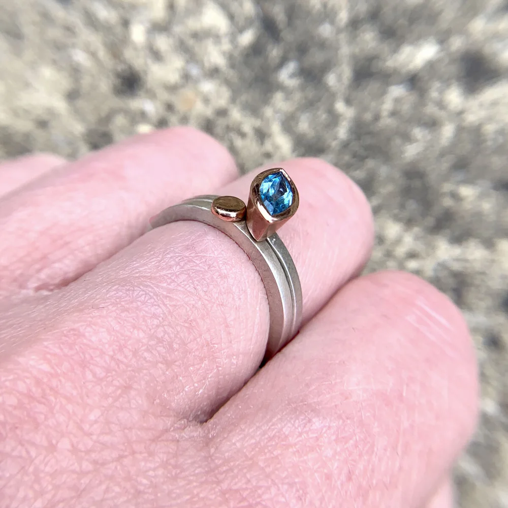 carat rose gold, Swiss blue topaz and silver stacking ring pair