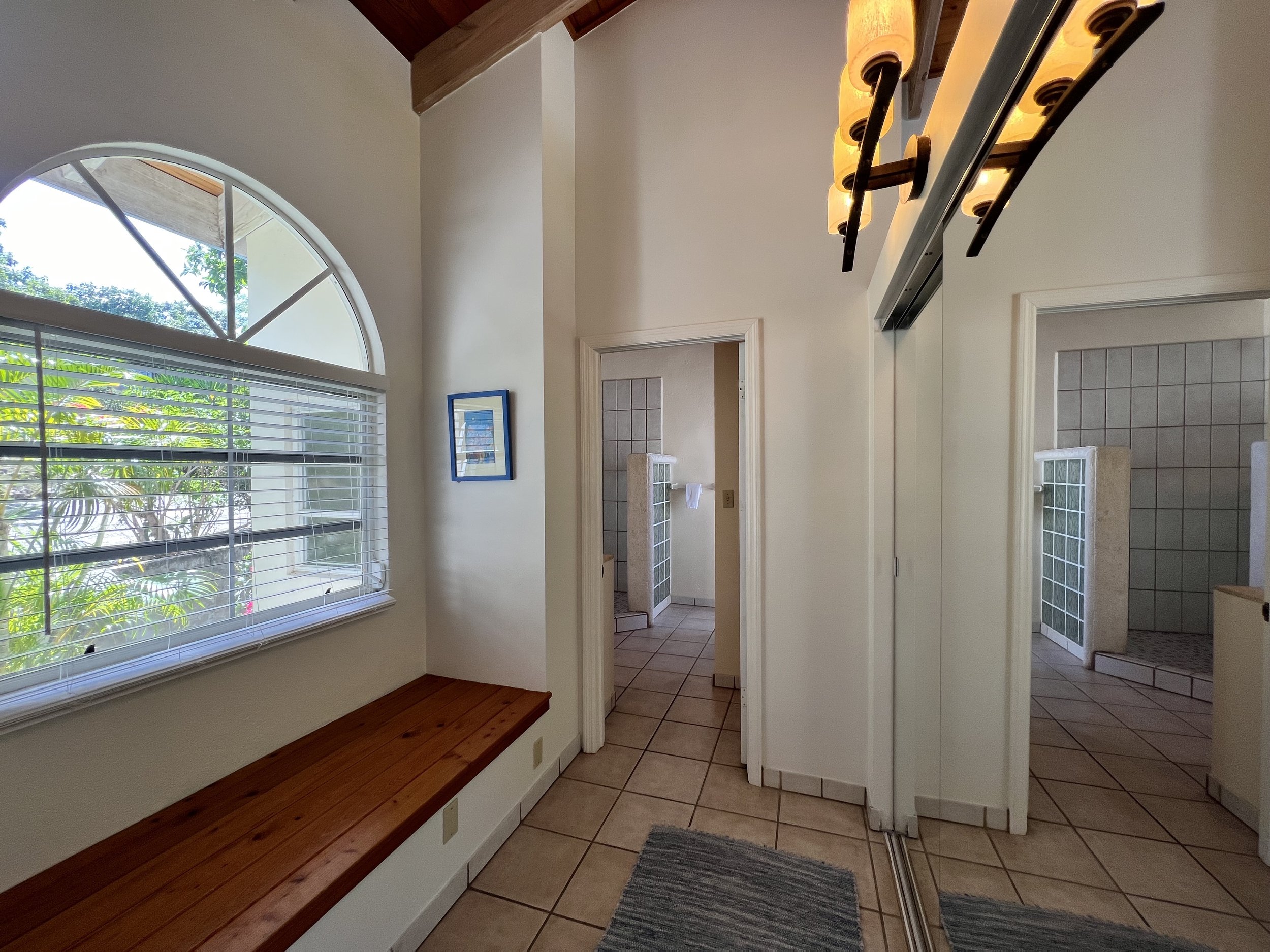 Hallway in each bedroom with closets and private bathrooms.jpg