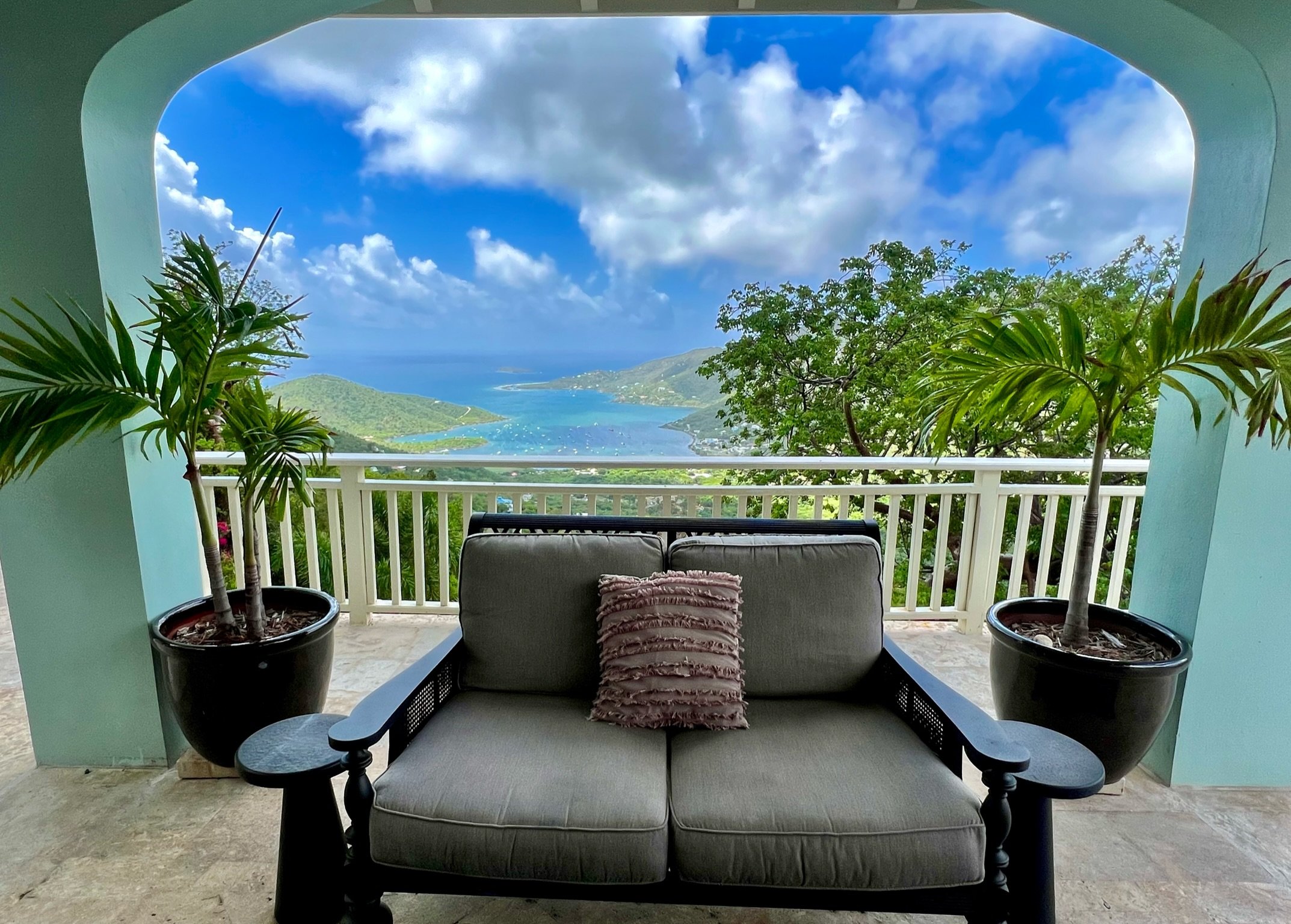 views from the covered deck and sitting area out to coral bay and the caribbean blue waters.jpg