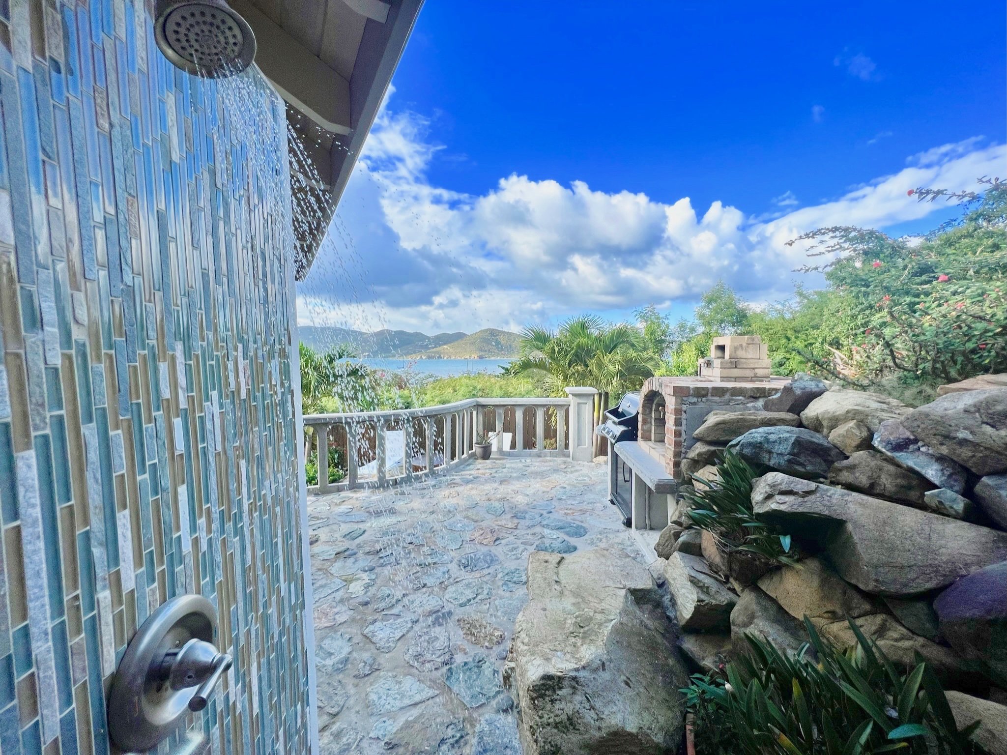 Main outdoor space with a shower for after the beach or pool.JPG