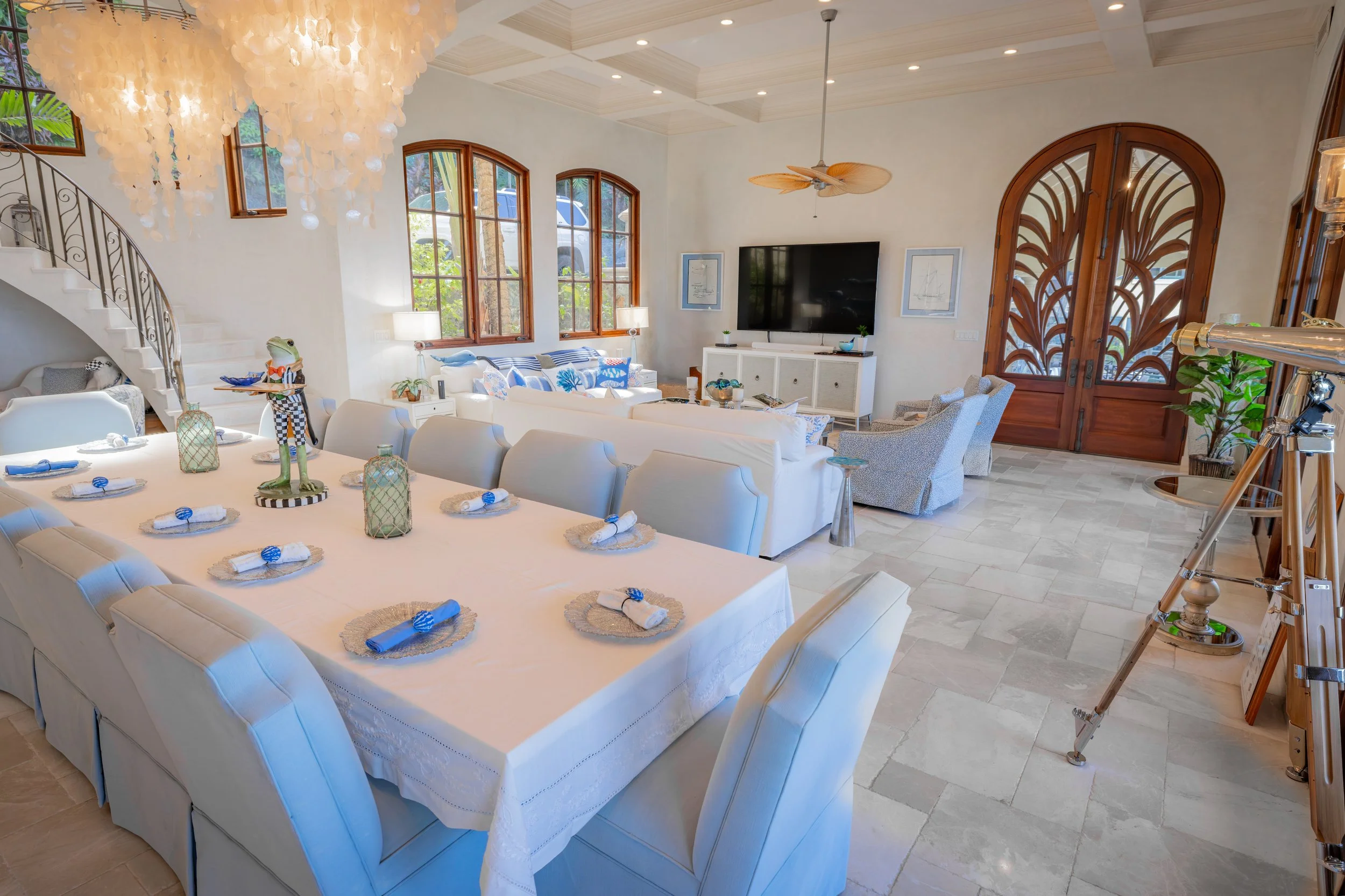 Dining and living room with grand door