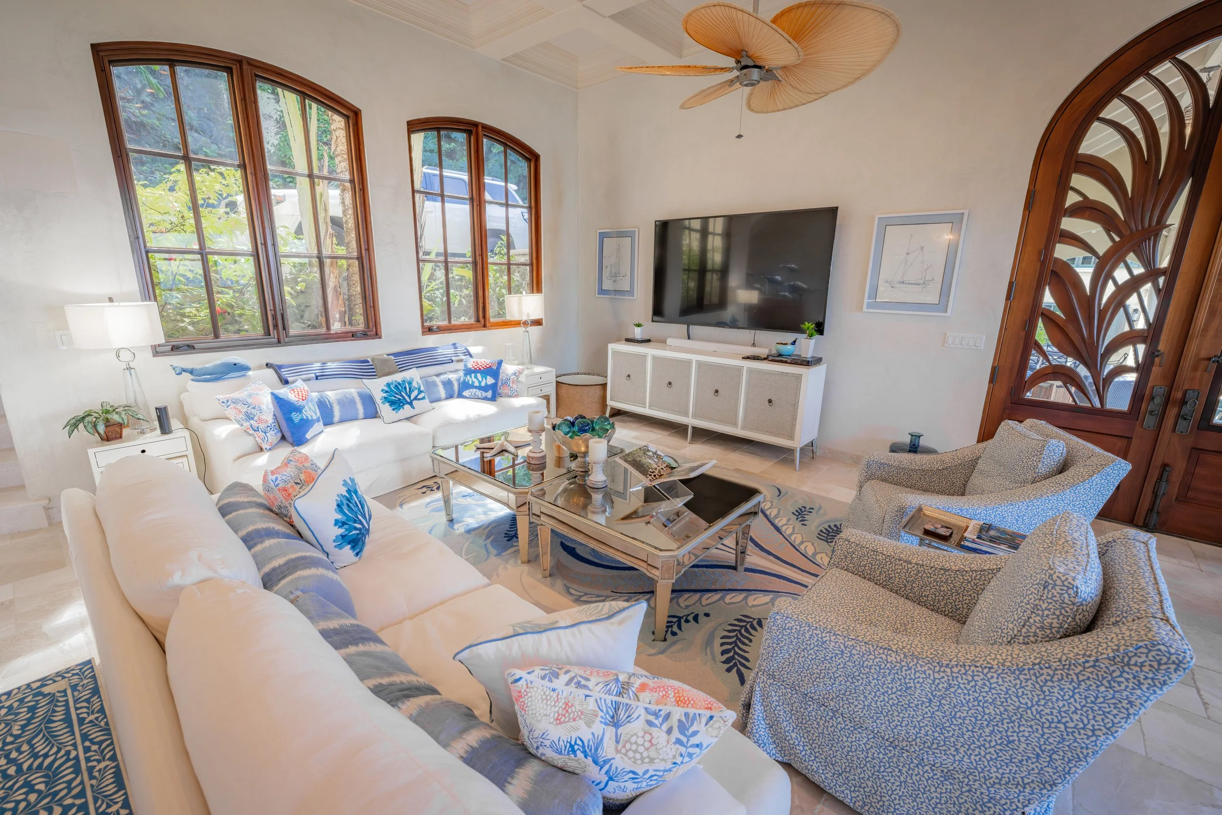 The living and dining main space with spiral staircase