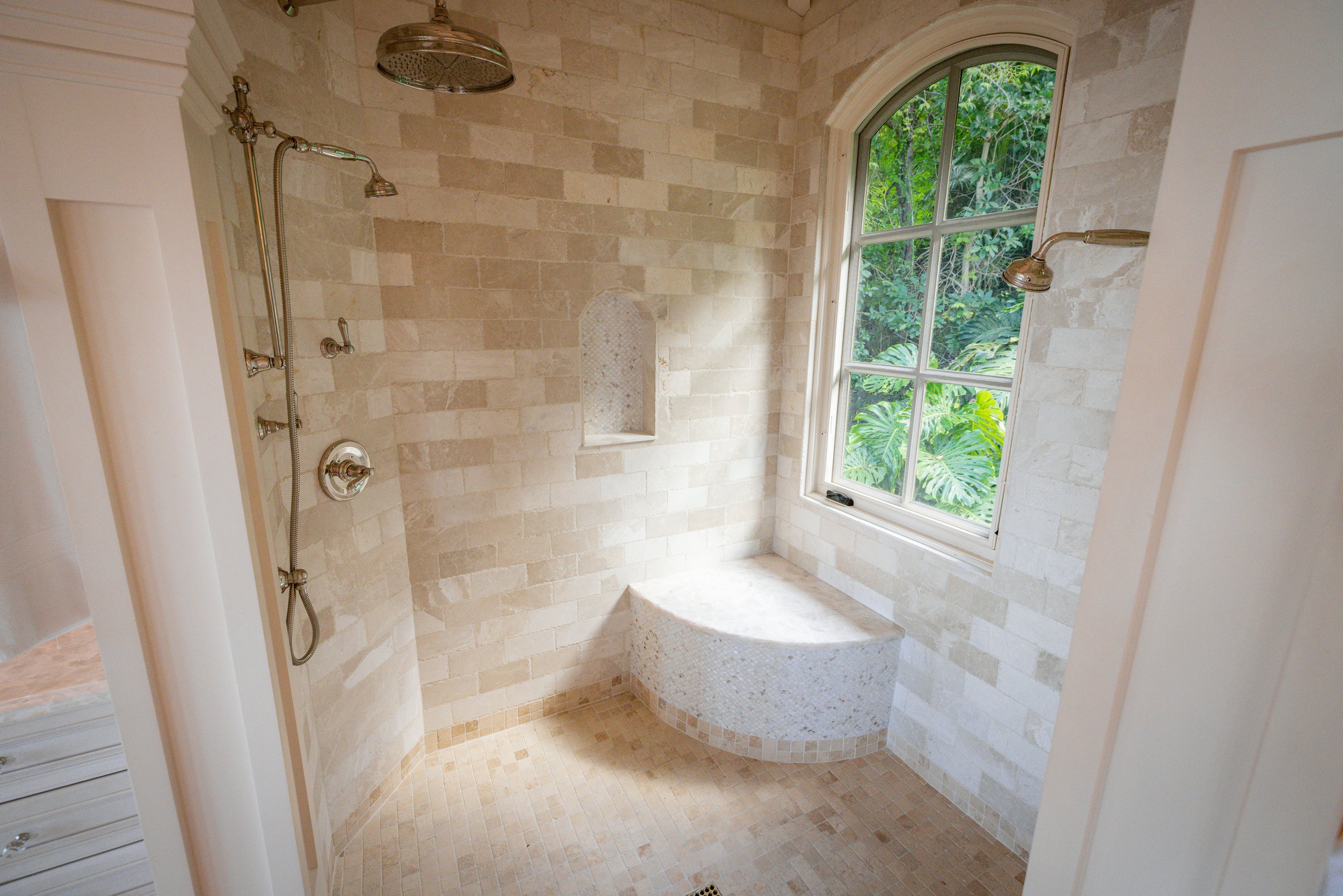 Primary king suite's en-suite bathroom that is unmatched on the island