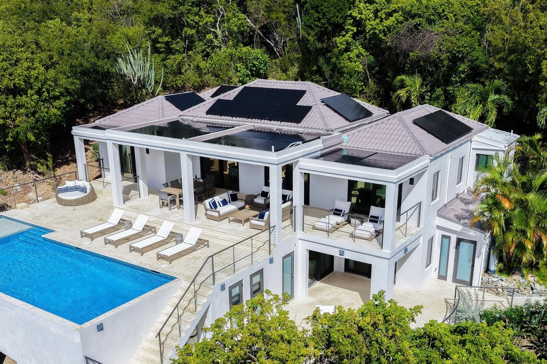 Full villa drone photo that shows upper and lower level