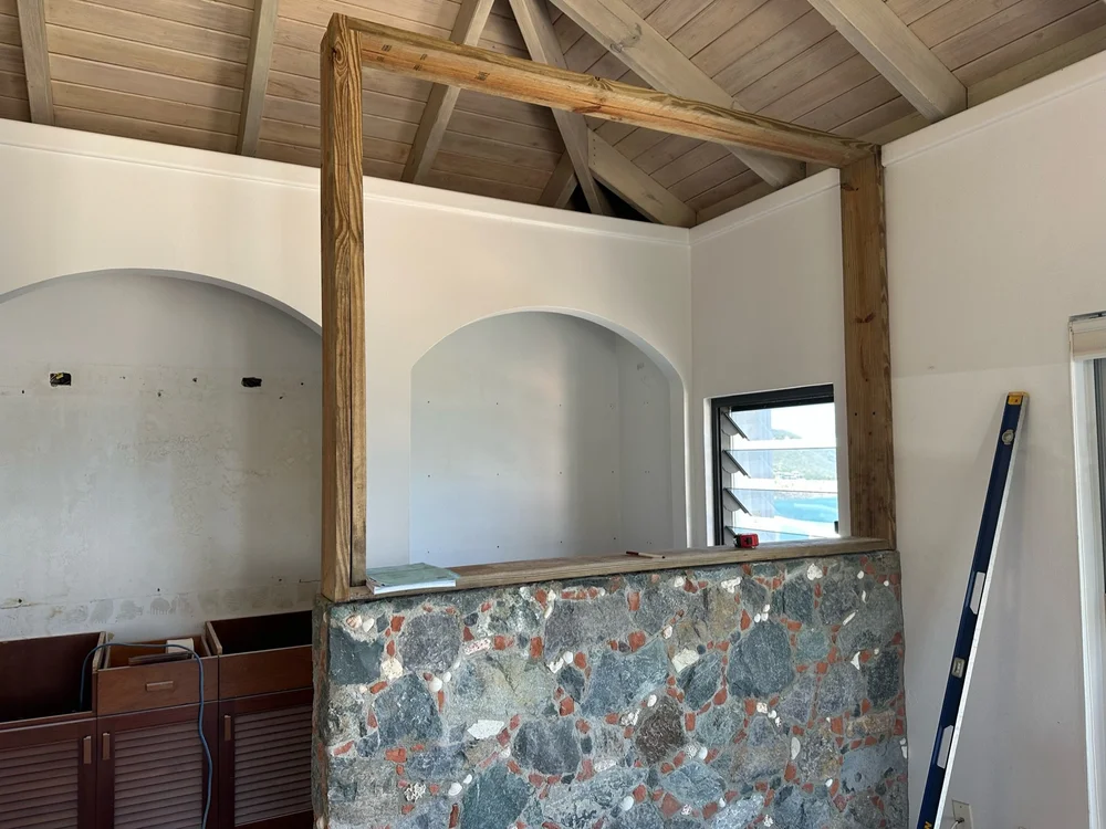 Completed full-height privacy wall at Altamira