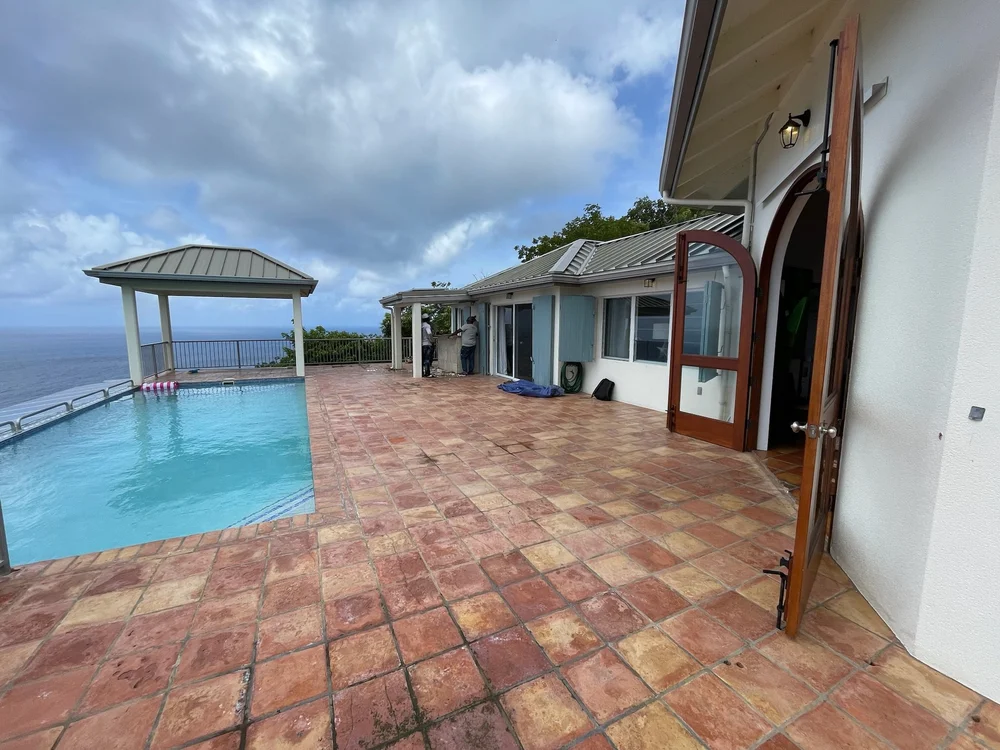 Original red-tile pool terrace at Villa Panache