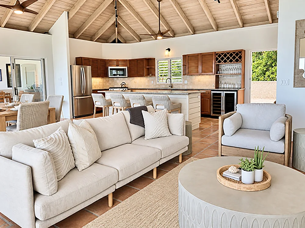 Open island living room arranged for comfort, flow and conversation