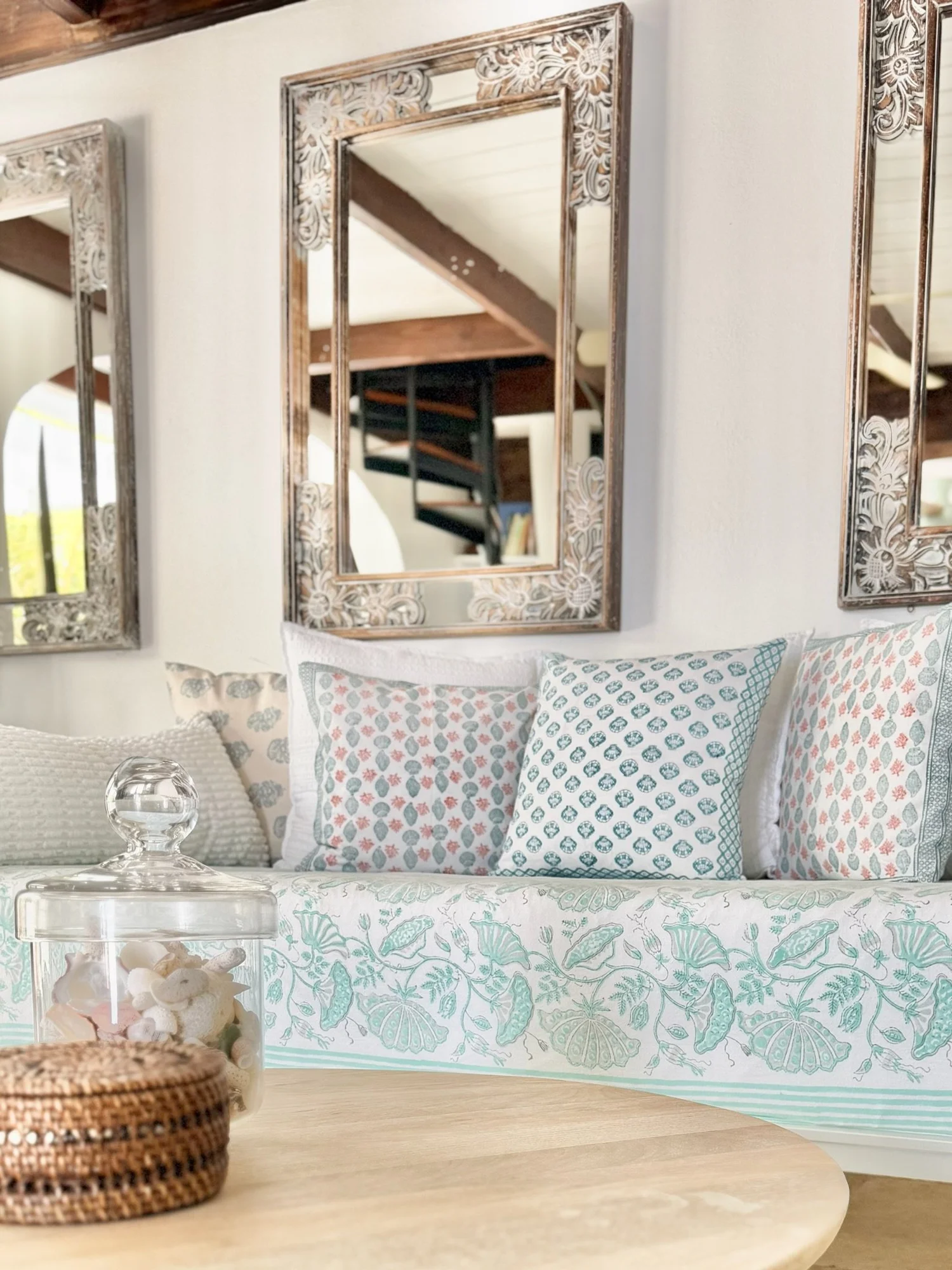 Patterned textiles, carved mirrors and collected coastal accessories