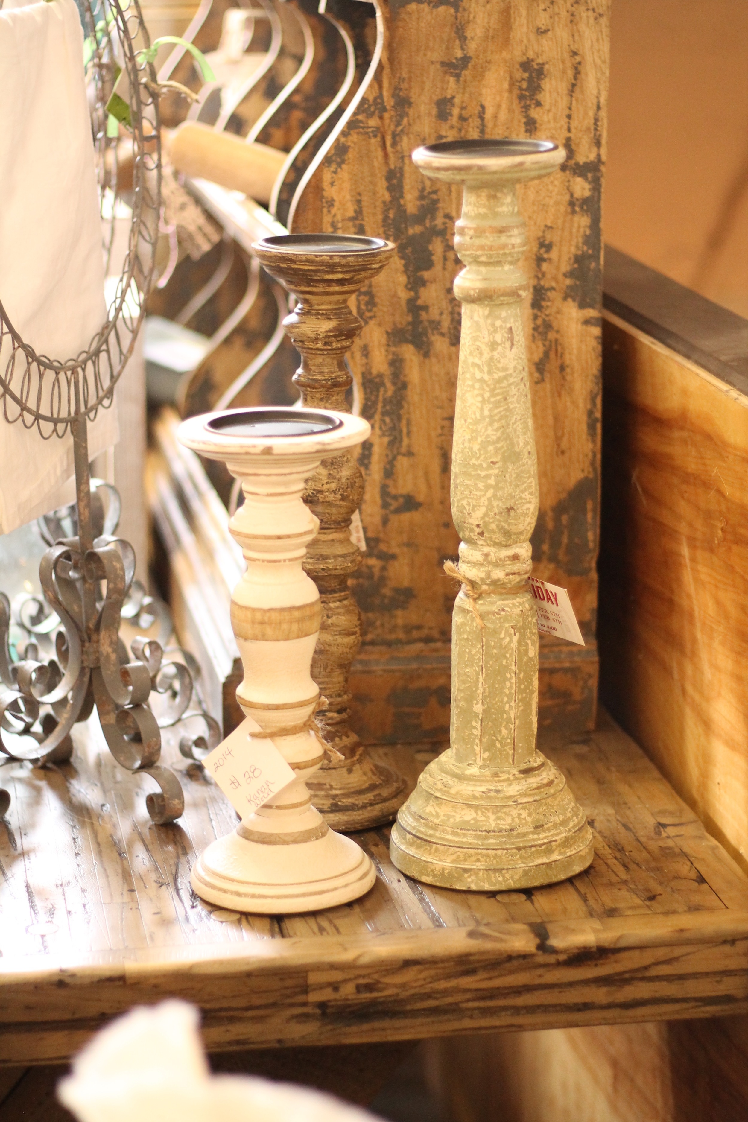 These candlesticks are another simple way to mix woods, whites, and textures. Photo from: Anna Huff