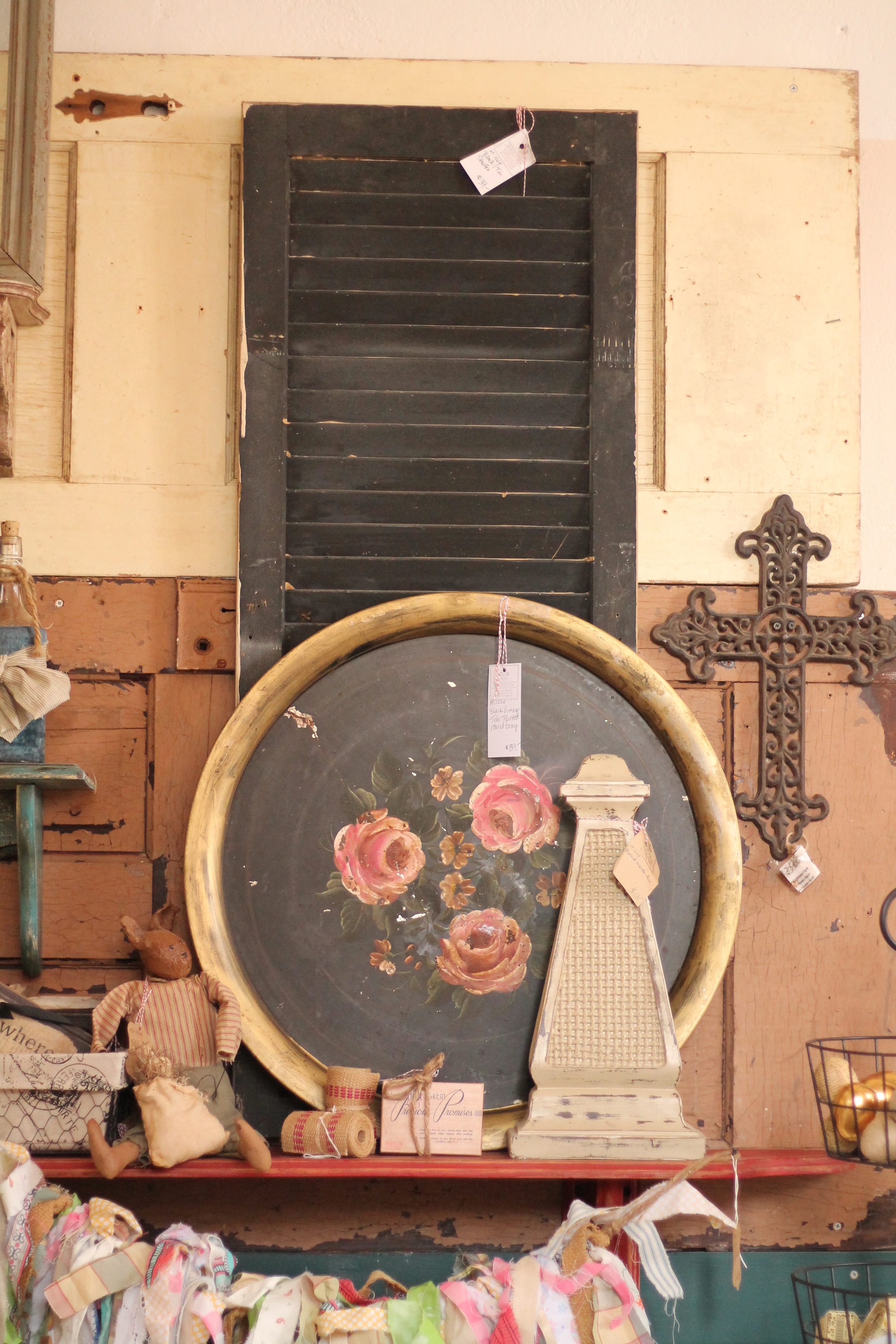 This gorgeous vintage rosebud tray would be a great statement piece on a shelf. Photo from: Anna Huff