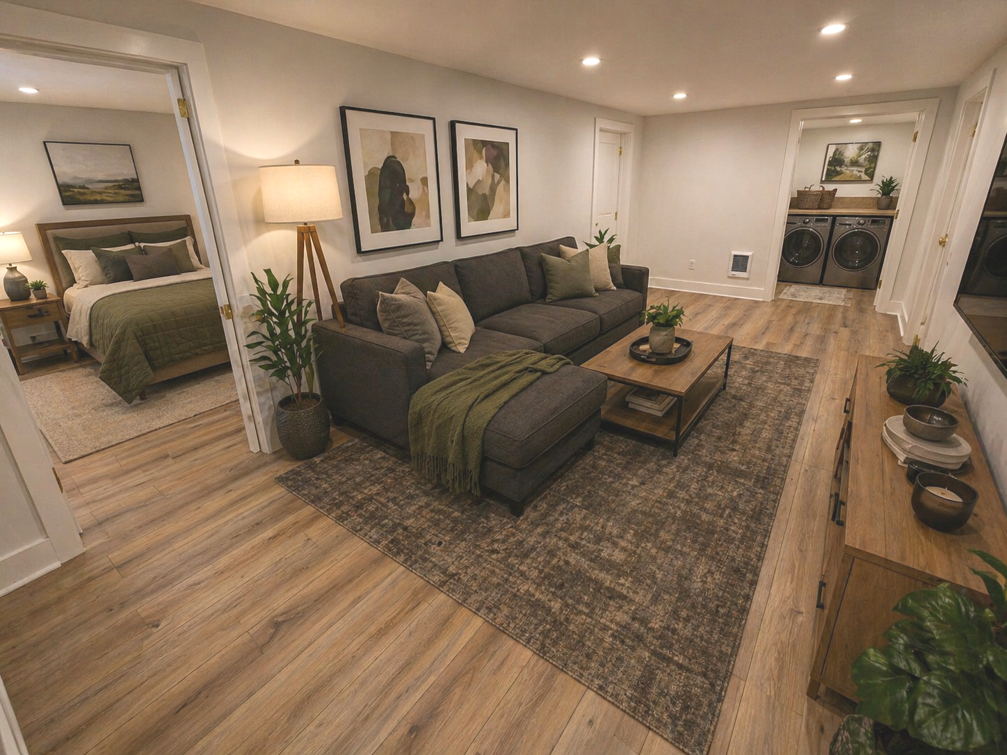 Clay basement remodel in Southeast Portland featuring a new bedroom, bathroom, laundry room, and family room