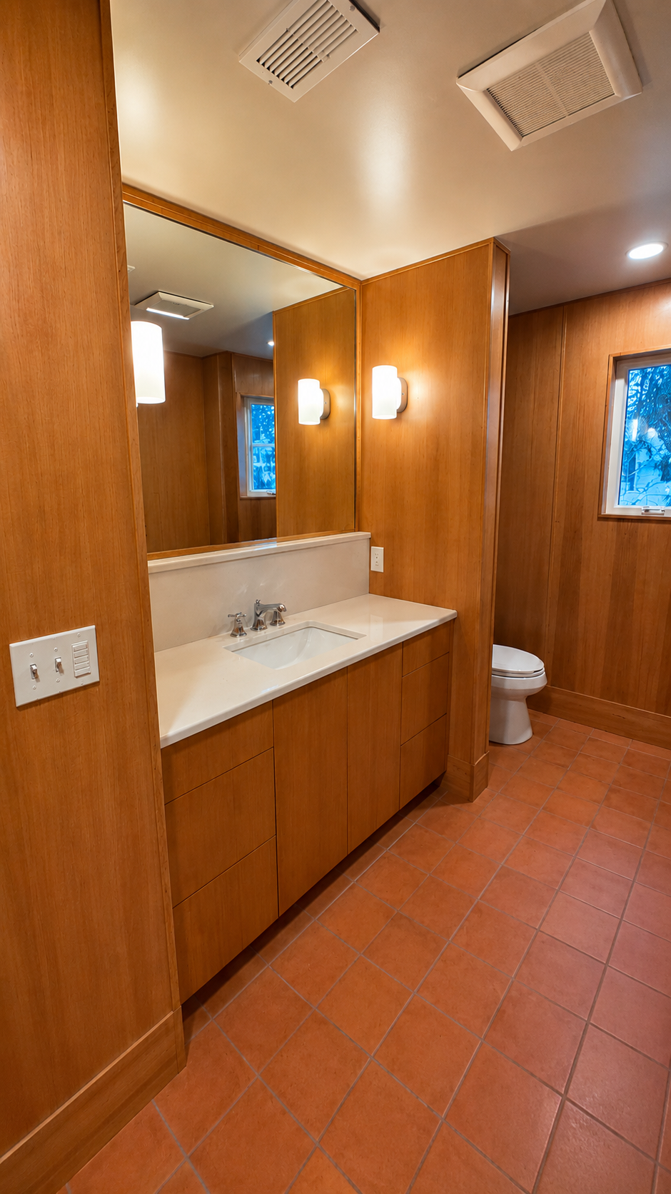Modern bathroom with custom vanity and premium finishes in a Milwaukie basement ADU.
