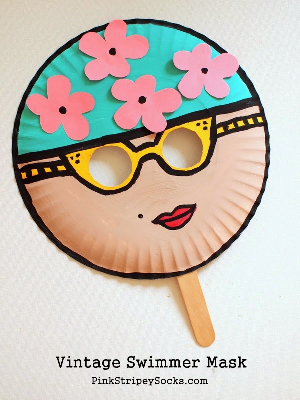 o make the mask, I simply cut out two holes for the eyes. Then I painted a face on the front of the paper plate and cut out some flowers from construction paper . Then I glued on the flowers and taped on a jumbo popsicle stick to the back of the paper plate.