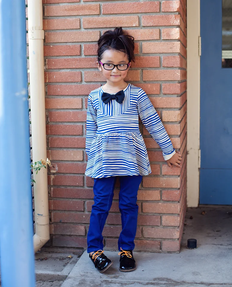 Kaori is wearing- Mini Rodini Striped Blouse and Junior Gaultier Trousers. 