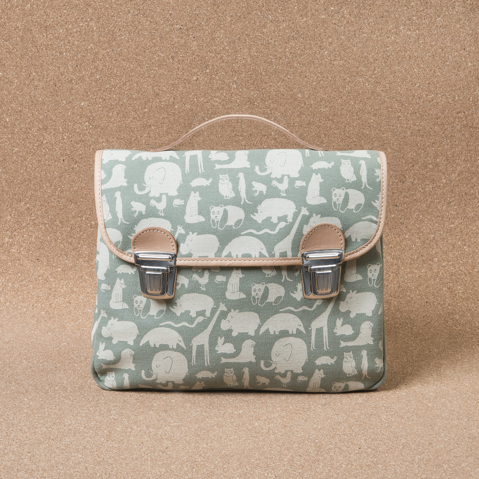Satchel made of animal printed canvas with leather detailing.