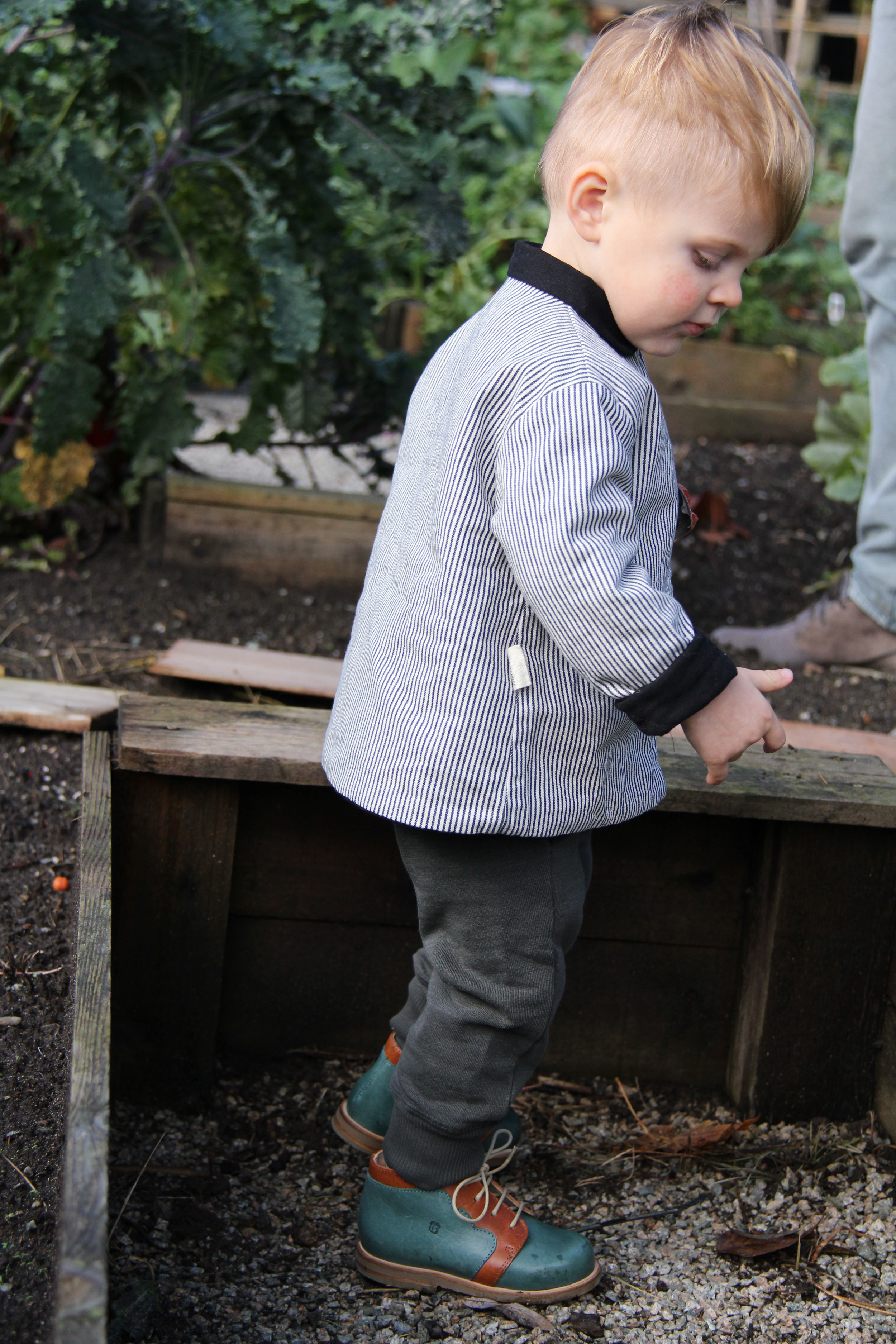 Red Creek Handmade Mini Mac Reversible quilted jacket (available mid-November) | Nico Nico Norman Sweat Pant in Charcoa l | Nathalie Verlinden 'Billy' Booties
