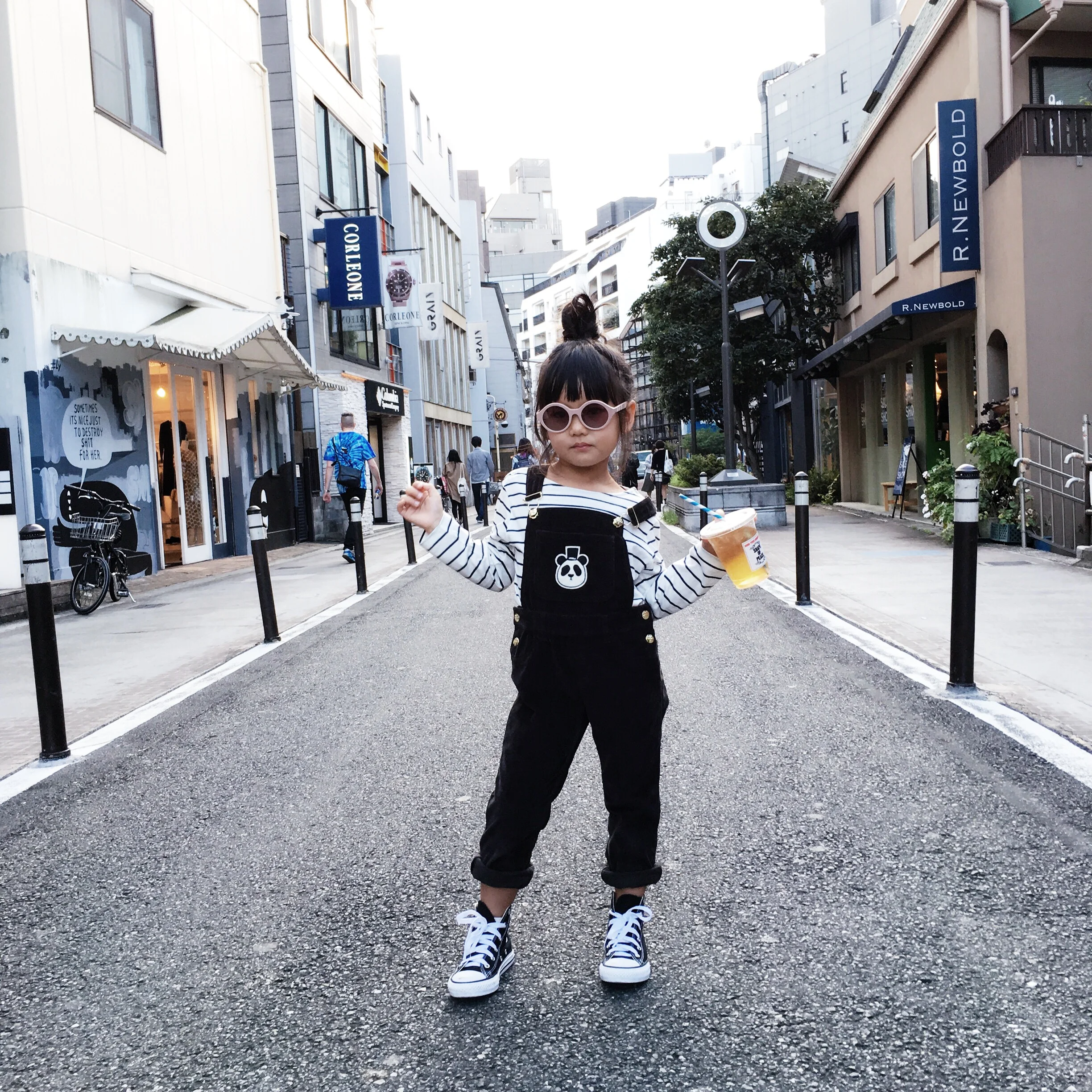 In the middle of CAT STREET in Harajuku: Shirt: Emile Et Ida from Minou Kids , Overalls: Mini Rodini from Minou Kids , Sunnies: Winkniks , Sneakers: Converse