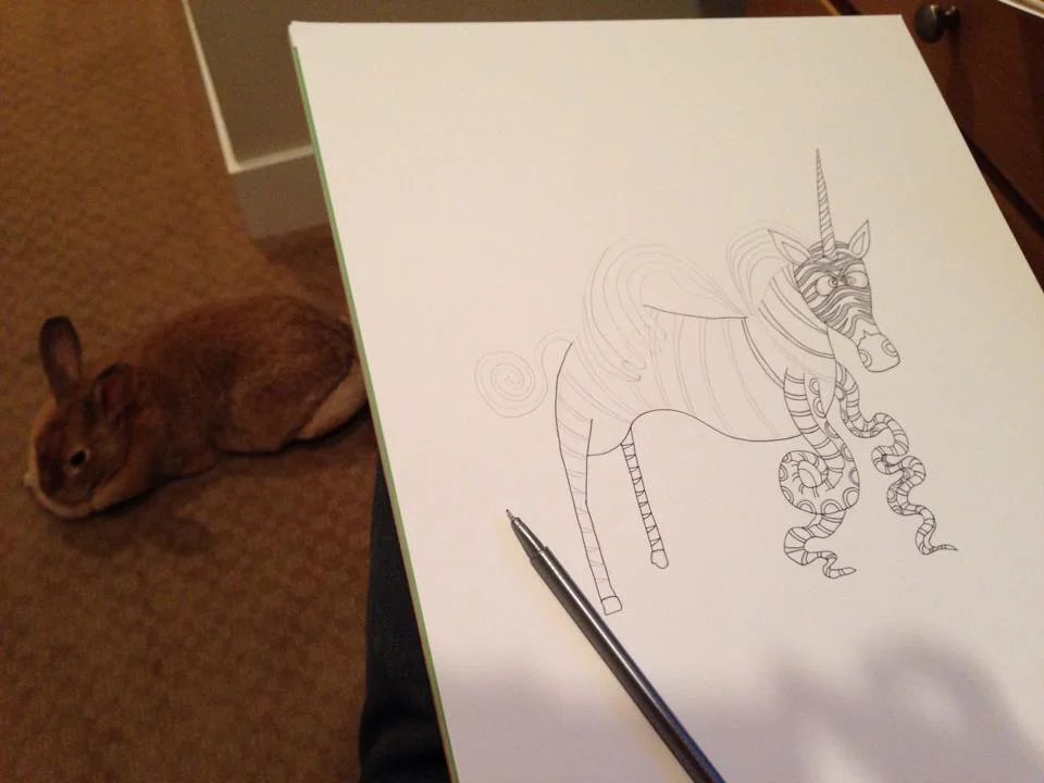 Drawing while my rabbit Buttercup hangs out. She likes to run up and down the stairs and then hang out by my feet.
