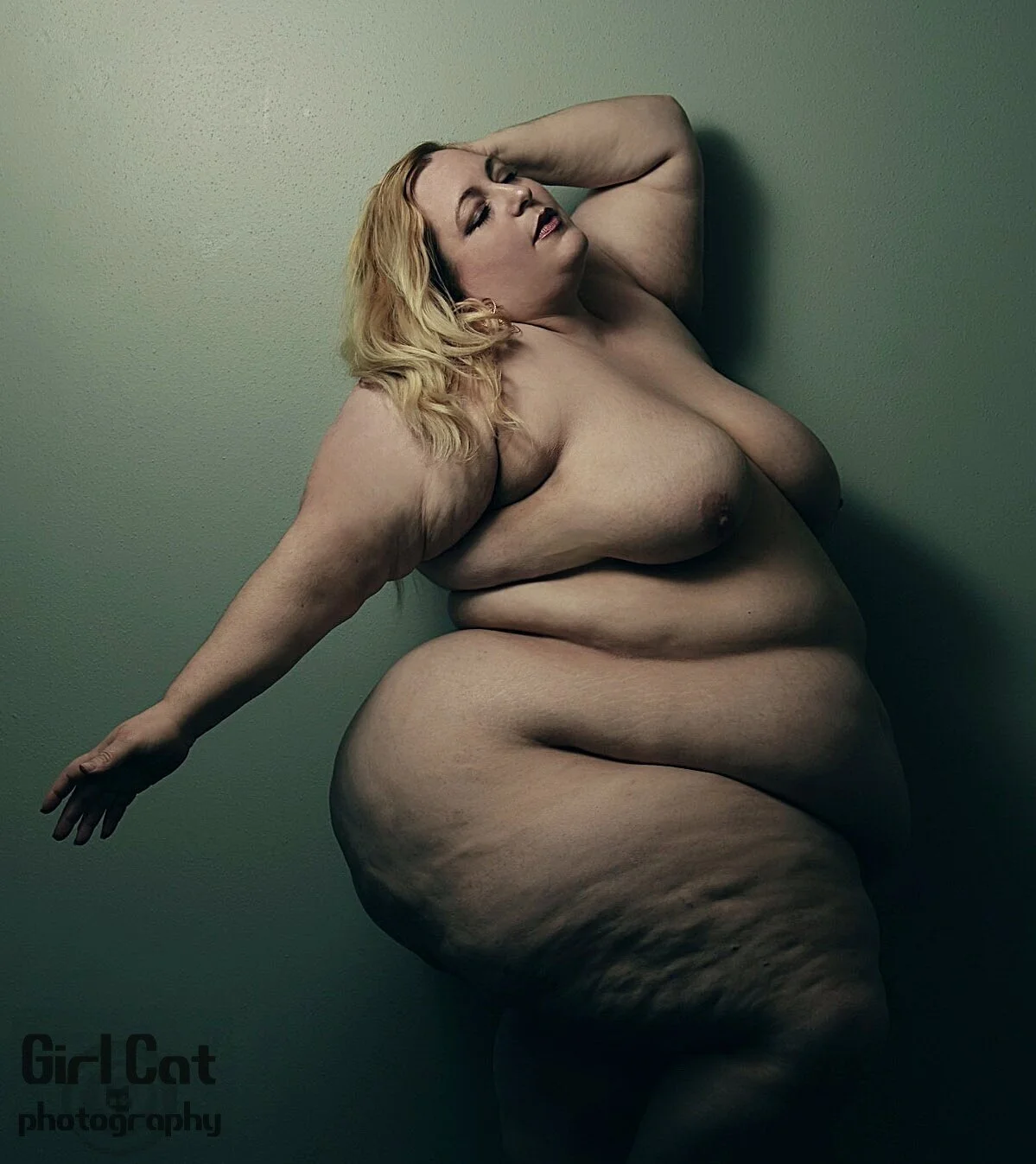  Vivienne Rose   "Her arms sweep above and away in celebration, unabashedly revealing her ample curves. The instruments of her hiding have become her wings.  Photographer Girl Cat Photography 