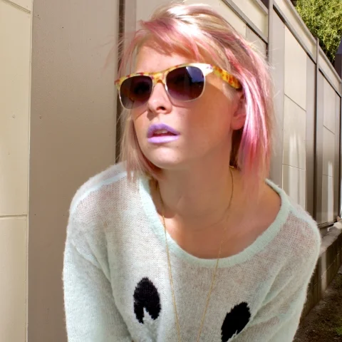 Along with my pink hair, I'm also obsessed with Lime Crime makeup - this crazy cool violet shade is called D'Lilac!