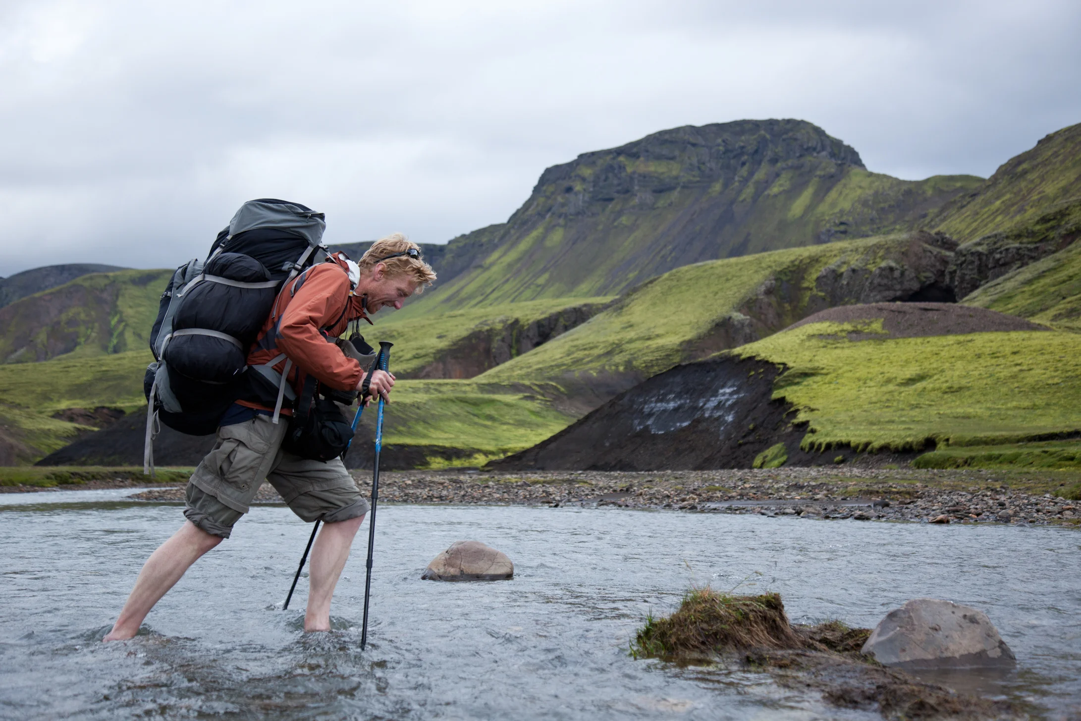 Alastair demonstrating the concept of Type II fun, crossing a freezing stream in Iceland. Read more about Al's trans-Icelandic adventures in our first print issue, on sale late May.