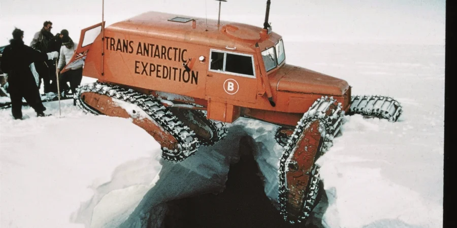 Vivian ‘Bunny’ Fuchs’ Sno-Cat Rock’n’Roll becomes jammed nose first in the far wall of a deep crevasse © The George Lowe Collection