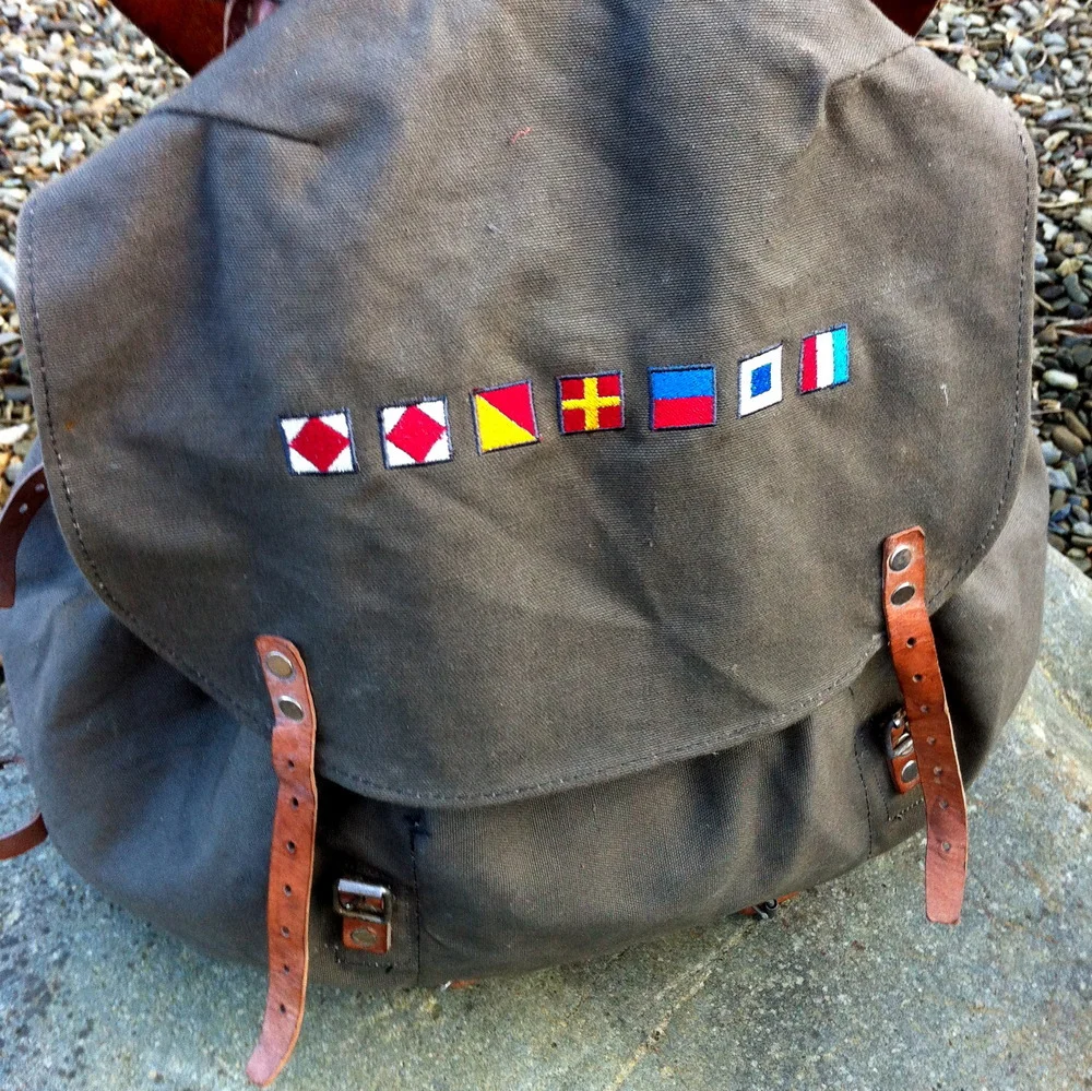 Fforest Utility Nautical Rucksack, £75 Second World War Swedish Army rucksack with strong canvas on metal frame and adjustable leather straps. Embroidered with beautiful nautical flags.