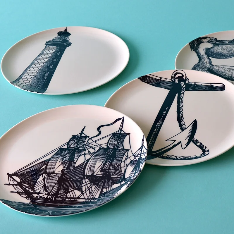 Nautical plates, £28 "A nautical-inspired kitchen set to keep your table looking ship shape". Scrimshaw set designed by New York-based Thomas Paul