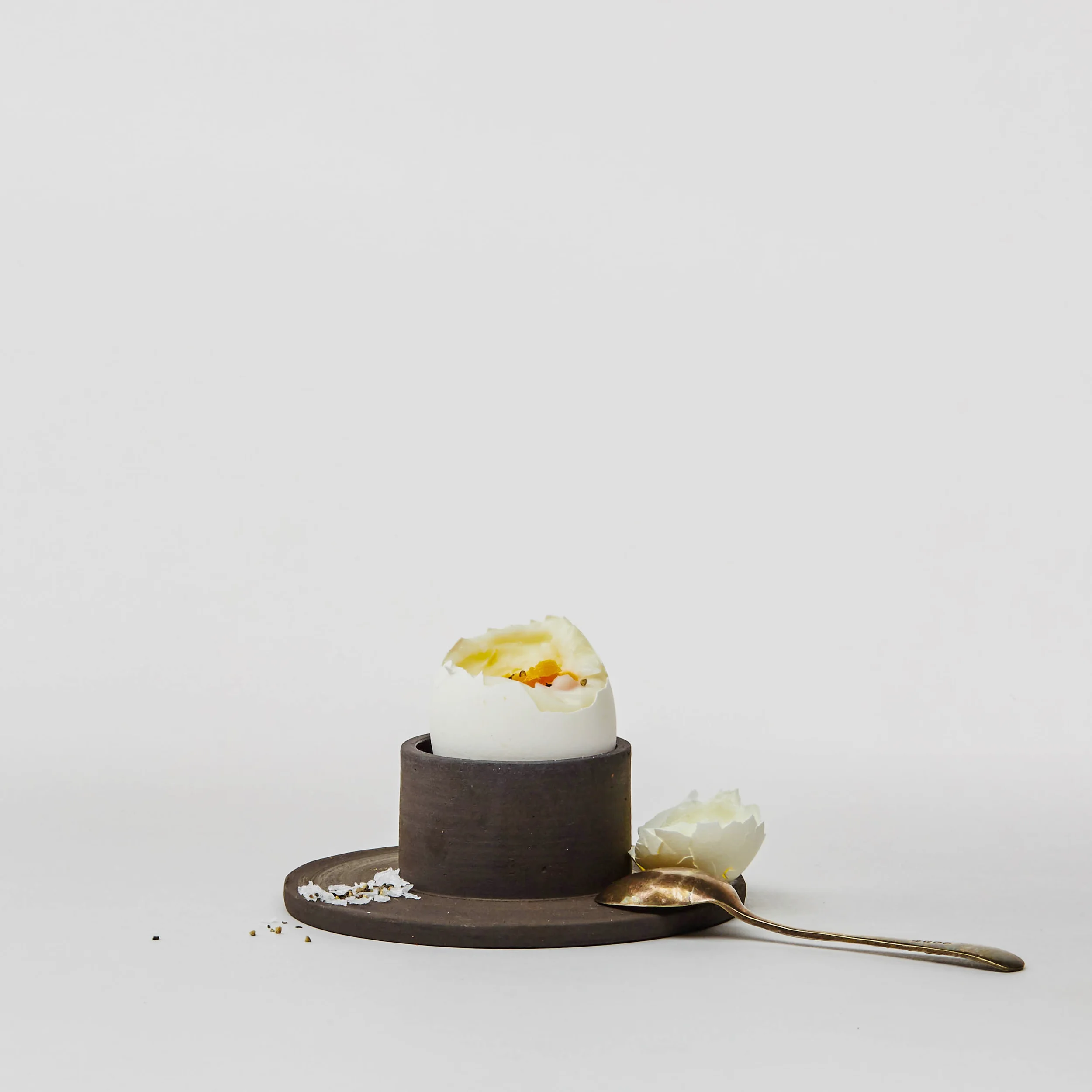 Jono Smart ‘Centre’ Egg Cup This slate-black egg cup will cradle a large egg beautifully, but its architectural design may steal the breakfast table limelight! £15