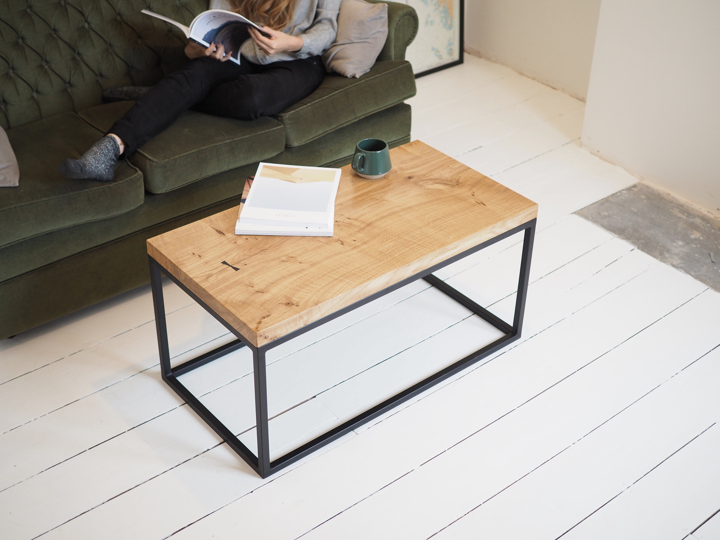 Grid Coffee table in white room with Amy.jpg