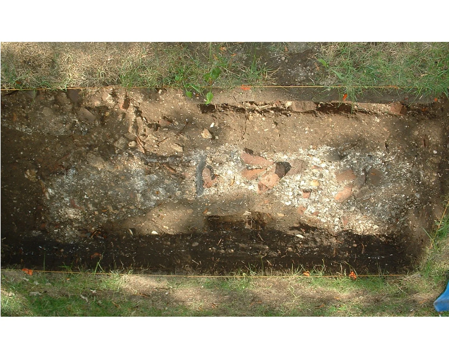Tabby fireplace base discovered in the West Yard at Rock Hall. It is thought this was Caribbean-style construction was built by enslaved Africans who lived at the site in the late 1700s (courtesy of Ross Rava).