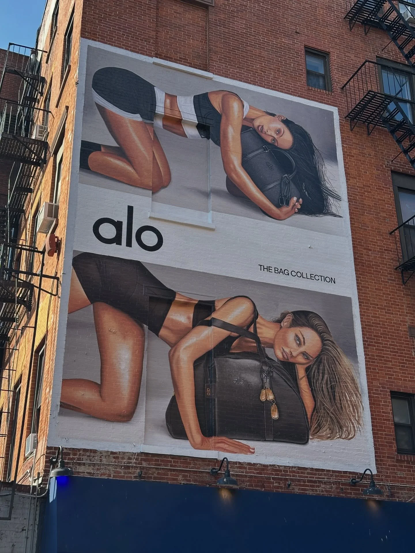 New hand painted billboard for @alo in NYC thanks to @heritageoutdoormedia  and our artist @msawyerballance for a great campaign 
#alo #handpainted #dowhatyoulove