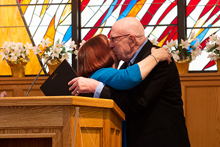 Vivian Waltz gives "Nonviolence Begins with Me!" award to Bill Marx