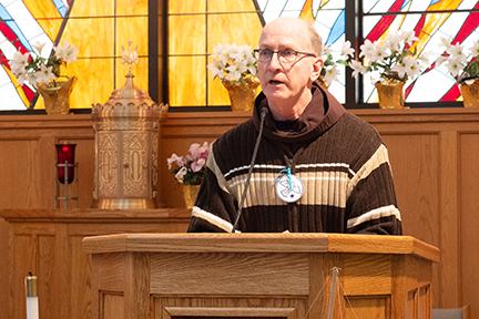 Fr. Jud Weiksnar welcomes all to SS. Columba-Brigid Church