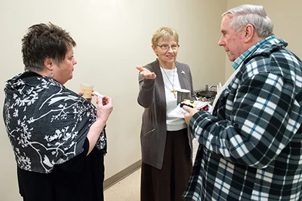 Paula Hunt, Sr. Roz Rosolowski and Fr. Roy Herberger