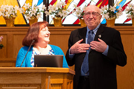 Vivian Waltz gives "Nonviolence Begins with Me!" award to Bill Marx