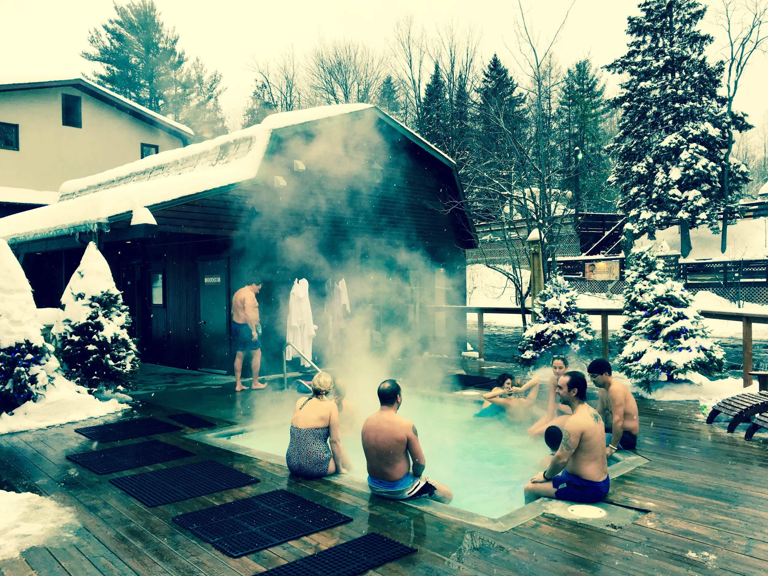 A nice warm spa under snowfall.