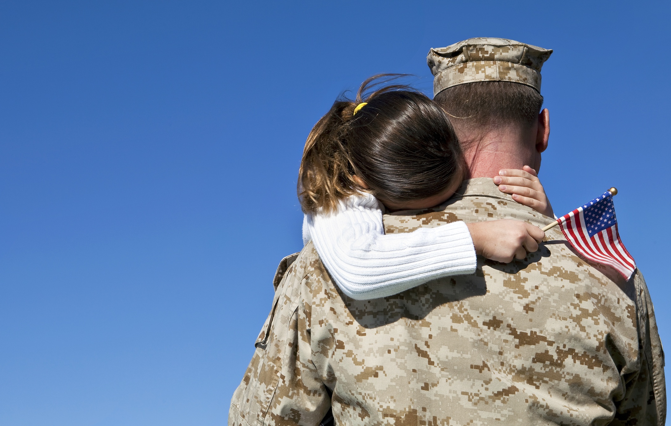 iStock-133724412 MILITARY DAD WITH DAUGHTER.jpg