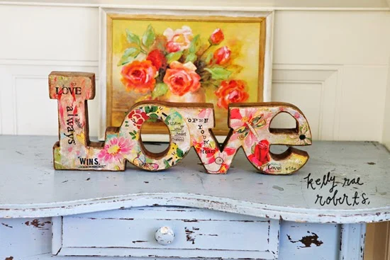 "Love," wood sculpture by Kelly Rae Roberts for DEMDACO