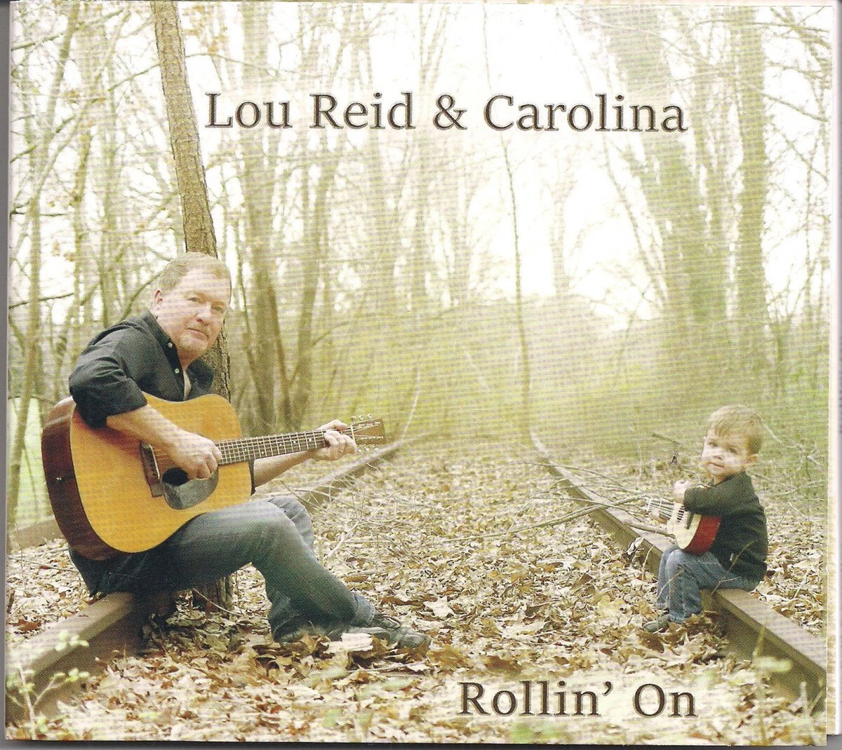 <b>Lou Reid & Carolina</b></br>Rollin' On</br><I><small>Stereo Master</small></I>