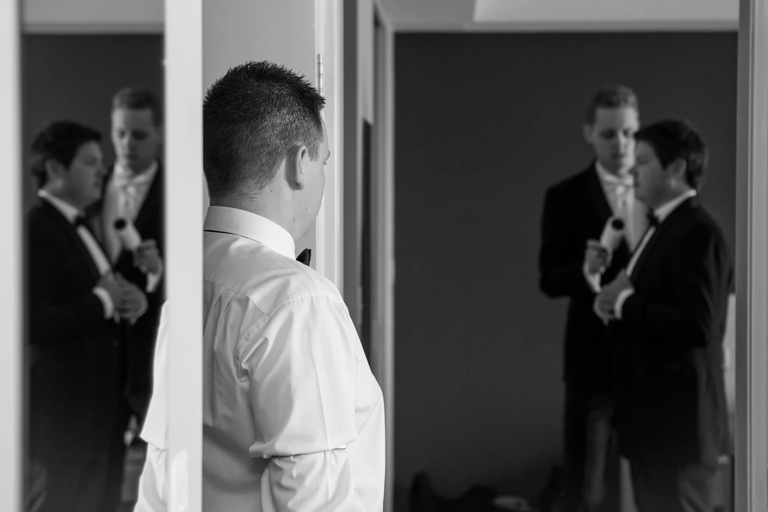 Dusting down the groom.