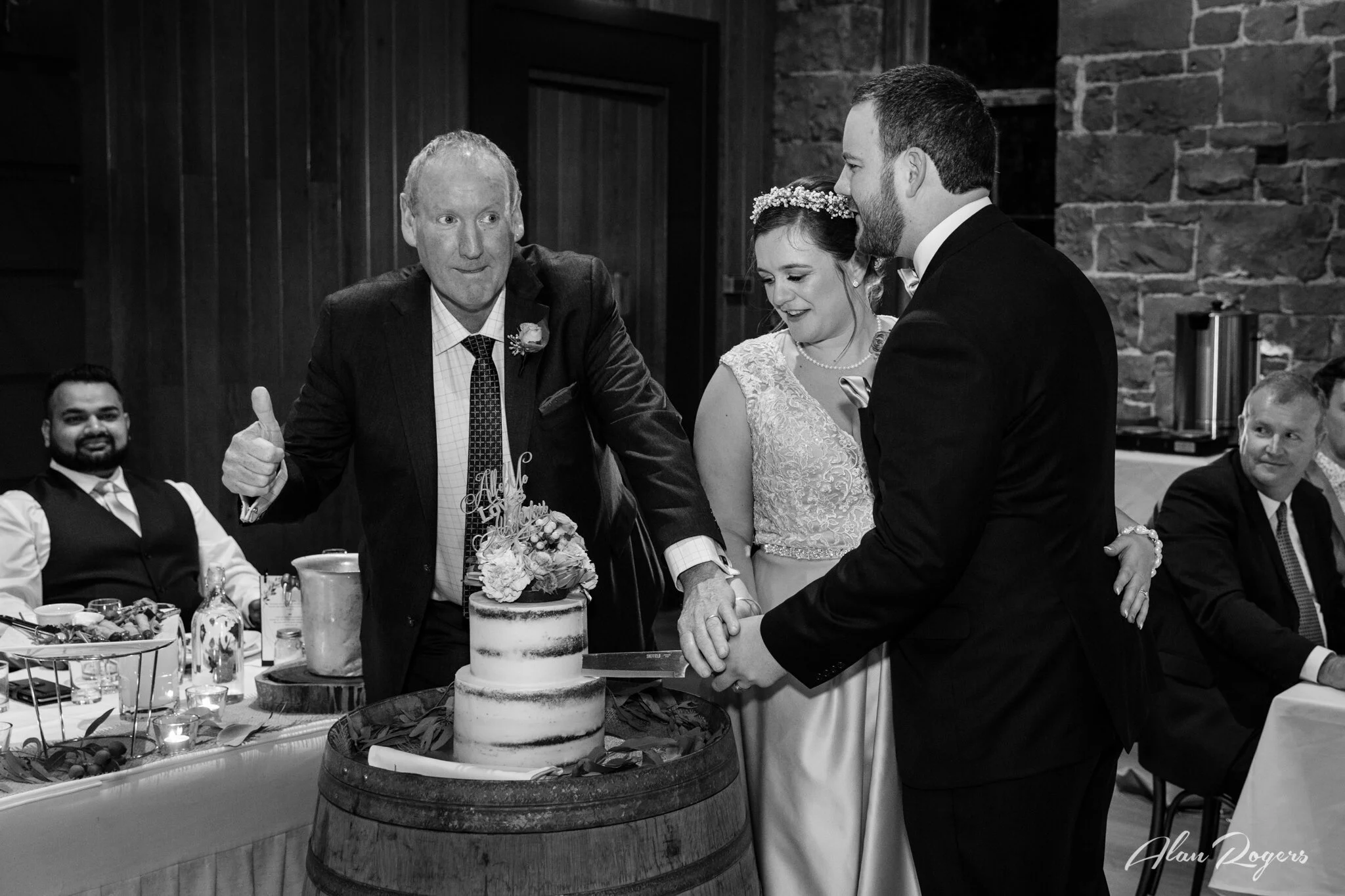 cake-cutting-with-grooms-dad.jpg