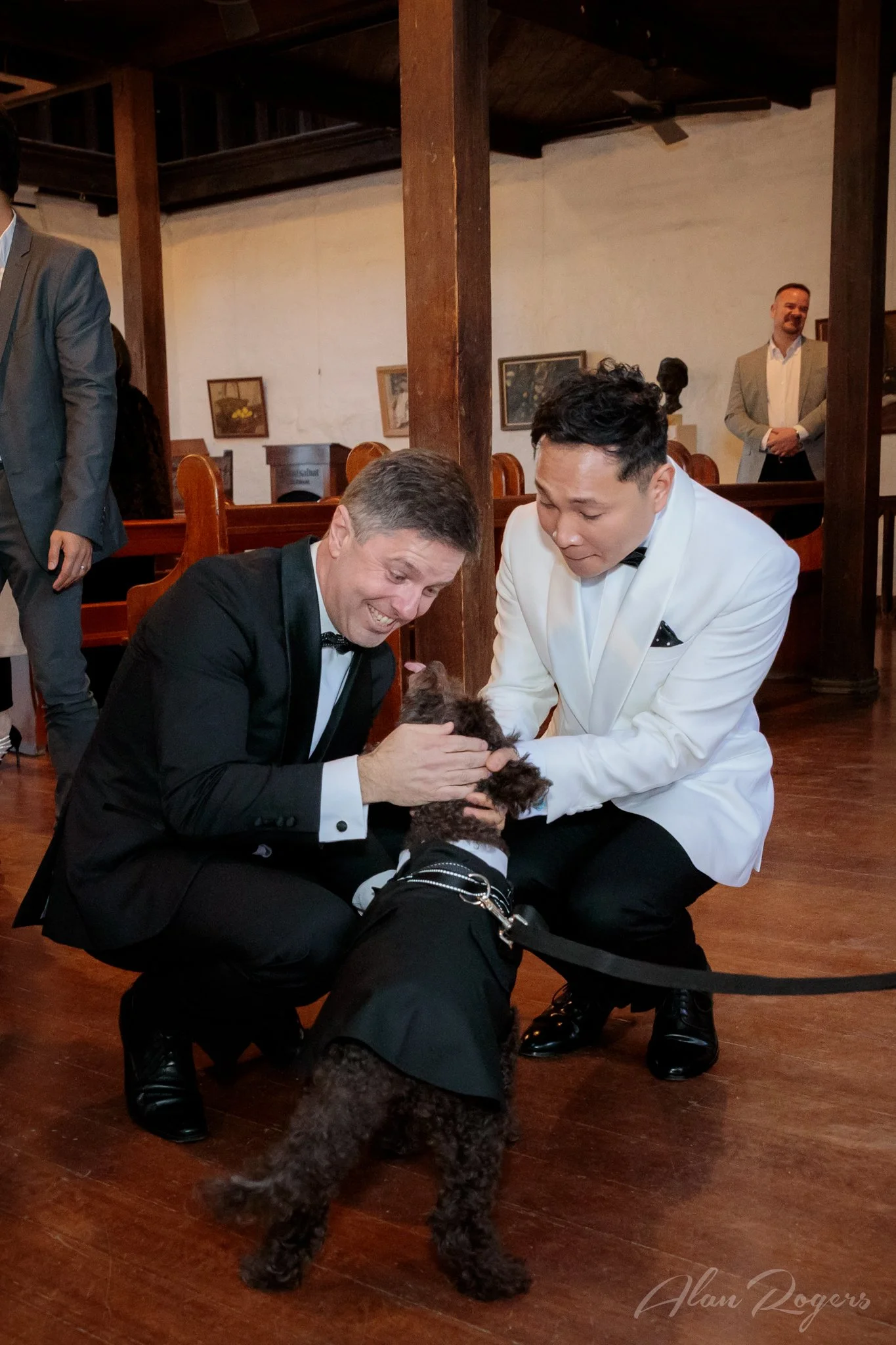 two-grooms-excited-puppy.jpg